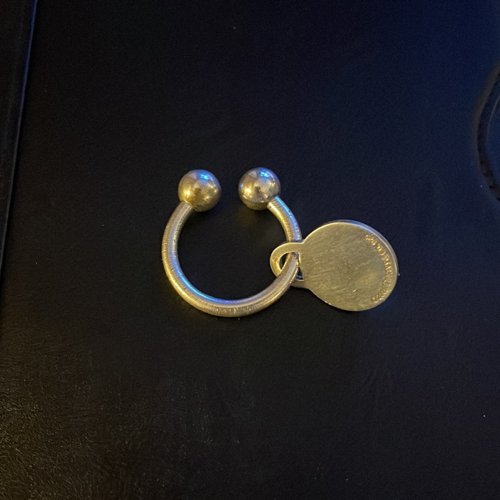 Vintage Tiffany & Co. 2001 Sterling Silver Key Ring with matching 2001 Charm